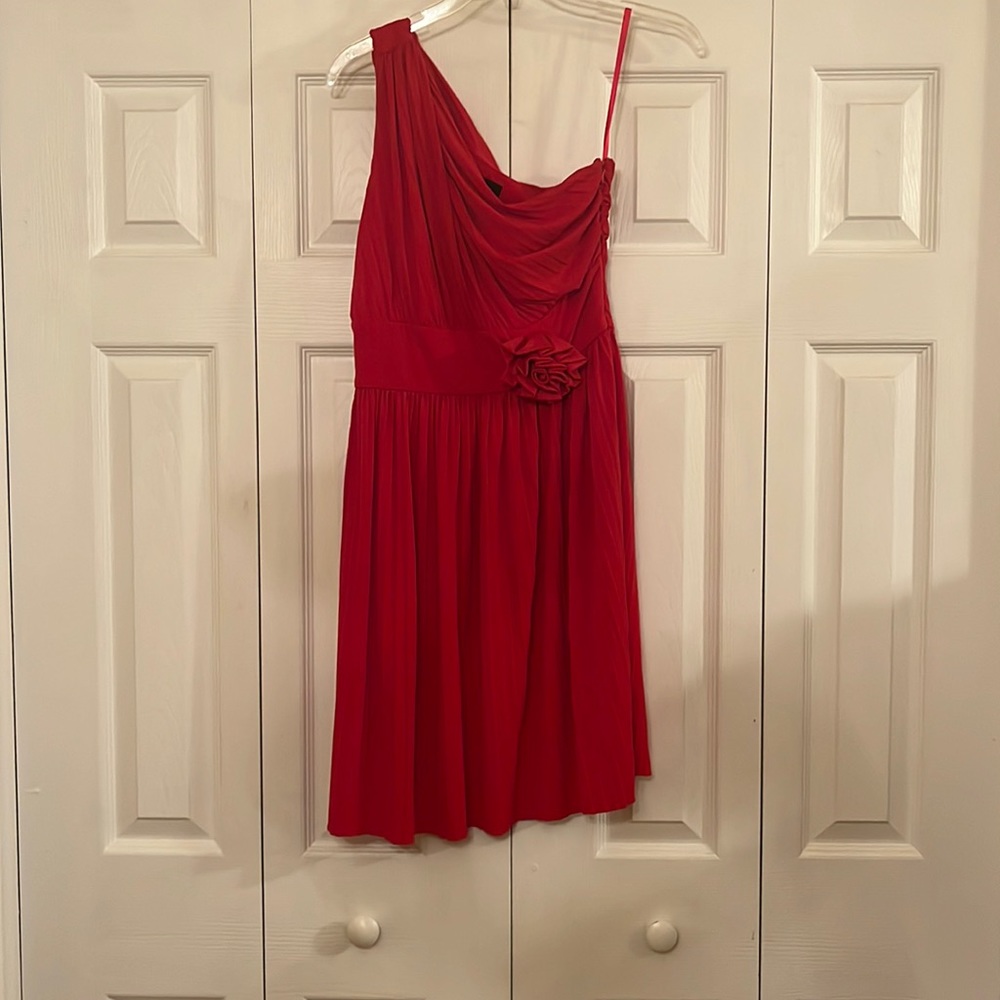 Red one shoulder pleated dress with rose